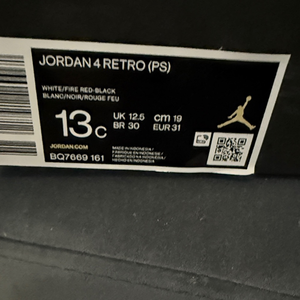 Jordan 4 Retro PS in White, Fire Red, and Black